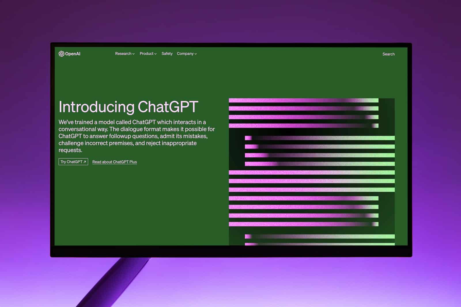 Monitor screen showing ChatGPT landing page
